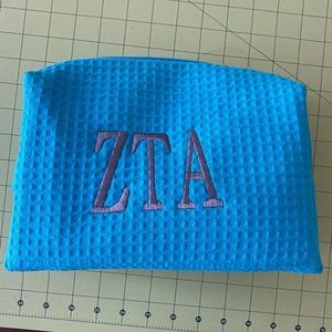 NWOT ZTA monogrammed make up bag